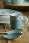 pip-blushing-birds-small-mug-mavi-1