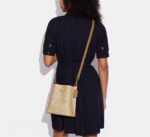 coach-mollie-bucket-krem-kahve-1-1.png