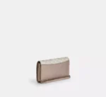 coach-anna-clutch-uzun-askili-canta-krem-1